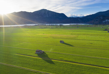 Germany, Bavaria, sunrise over Lake Kochel with Jochberg, aerial view - SIEF08481