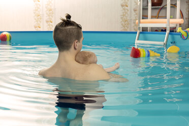 Baby swimming, father and son in swimming pool - VGF00254