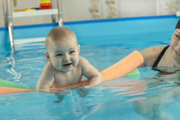 Baby swimming, mother with daughter in swimming pool - VGF00268