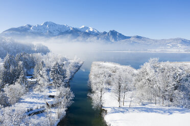 Germany, Upper Bavaria, Kochel, Aerial view of Lake Kochel in winter, Herzogstand and Heimgarten in the background - LHF00627