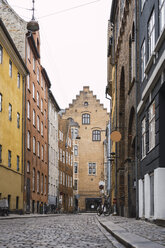 Denmark, Copenhagen, Narrow alley with cobblestone pavement in the old town - AFVF02712