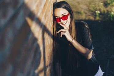 Spain, portrait of a happy teenage girl - ERRF00852