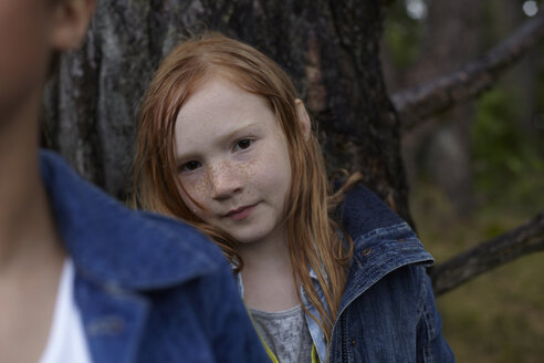 Portrait of redheaded girl at a tree - AMEF00061