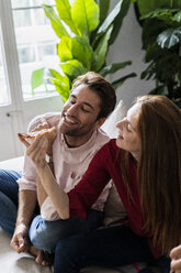 Friends having fun, eating pizza - GIOF06104