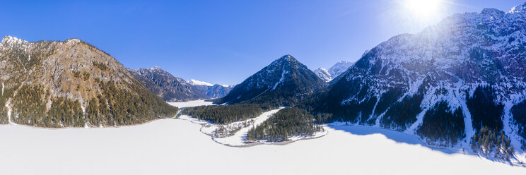 Austria, Tyrol, Ammergau Alps, Heiterwanger See in winter, aerial view - STSF01890