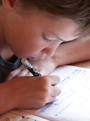 Boy doing his homework - WWF05006