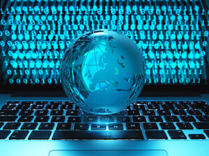 Globe illustrating the world on a laptop computer with screen been infected by a cyber attack - ABRF00363