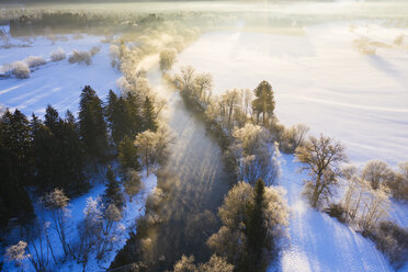 Germany, Bavaria, sunrise at Loisach river near Eurasburg in winter, aerial view - SIEF08552