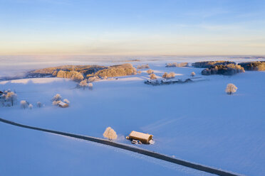 Germany, Bavaria, near Münsing, winter landscape at sunrise, aerial view - SIEF08562