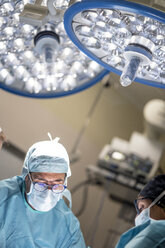 Portrait of doctor surgeon during operation - OCMF00393