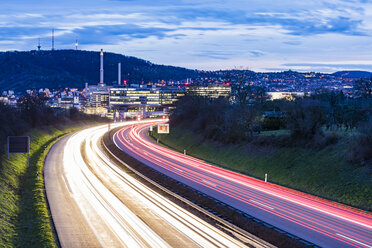 Germany, Badenwurttemberg, Light trails on federal highway near Unterturkheim - WDF05237