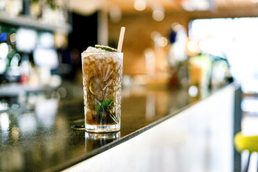 Close-up of cocktail on counter of a bar - ERRF01136