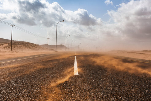 Sultanate Of Oman, Ras al Hadd, Desert road in a sand storm - WVF01128