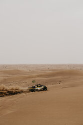 United Arab Emirates, Dubai, Lahbab Desert, 4x4 car driving through the desert - LHPF00531
