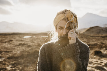 UK, Scotland, Loch Lomond and the Trossachs National Park, portrait of young woman in rural landscape - LHPF00575