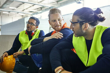 Workers in factory having a break together - ZEDF02123