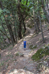 Italy, Liguria, Portofino, girl hiking on coastal trail - HSIF00531