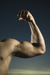 African American man flexing biceps - BLEF00022