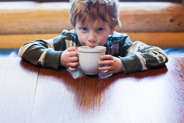 Caucasian boy drinking hot chocolate - BLEF00128