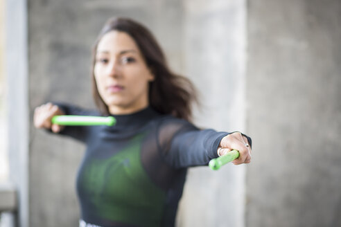 Young woman doing pound fitness exercise - ASCF00981