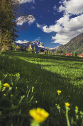 Italy, Trentino Alto Adige, Vigo di Fassa, view of the village and Dolomites mountains - FLMF00187