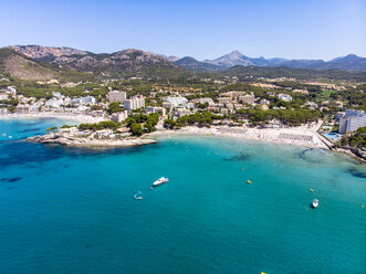 Spain, Majorca, Costa de la Calma, aerial view over Peguera with hotels and beaches - AMF06937