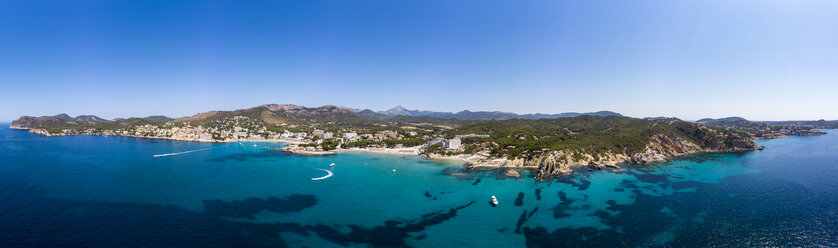 Spain, Majorca, Costa de la Calma, aerial view over Peguera with hotels and beaches - AMF06940