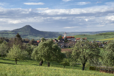 Germany, Weiterdingen, meadow with scattered fruit trees and Hegau volcano in the back - ELF02018