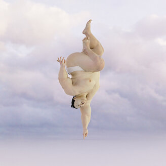 Sumo wrestler balancing upside-down on finger - BLEF00370