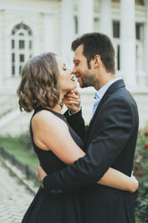 Portrait of smiling Caucasian couple kissing - BLEF00377