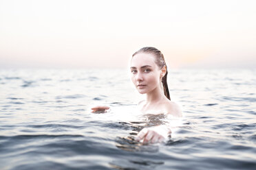 Portrait of serious location woman swimming - BLEF00394