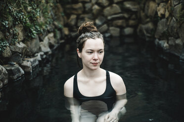 Caucasian woman swimming in pond - BLEF00691