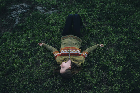 Caucasian woman laying in grass - BLEF00742