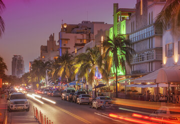 Cars driving in street at night, Miami Beach, Florida, United States - BLEF00951