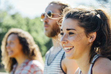 Close up of smiling woman with friends - BLEF01520