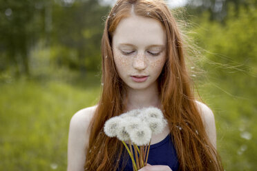 Caucasian girl with dandelion seeds hair - BLEF01636