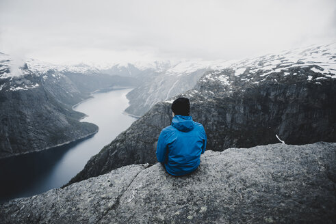 Caucasian man admiring scenic view of mountain river - BLEF01675