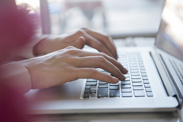 Hands of Caucasian woman typing on laptop - BLEF01786