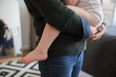 Caucasian mother holding daughter - BLEF01963