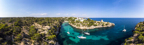 Spain, Balearic Islands, Mallorca, Llucmajor, Aerial view of bay of Cala Pi and Torre de Cala Pi stock photo