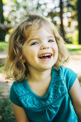 Portrait of laughing Caucasian preschool girl - BLEF02480