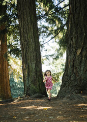 Caucasian girl running in forest - BLEF02870