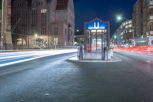 Germany, Berlin-Neukoelln, view to city hall and underground station at night - TAMF01397