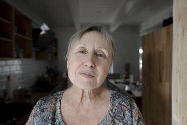 Portrait of a senior woman at home - KMKF00918