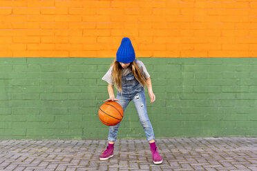 Young girl playing basketball, dribbling - ERRF01228