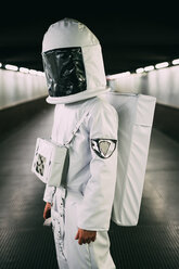 Astronaut on covered bridge - CUF50683