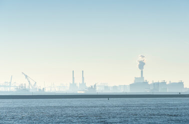 Netherlands, Amsterdam, View of Tata steel plant on North Sea coast -  SuperStock