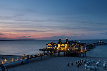 Traditional pier illuminated at sunset, elevated view, Sellin, Rugen, Mecklenburg-Vorpommern, Germany - CUF50937