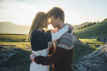 Caucasian couple rubbing noses and hugging - BLEF03128