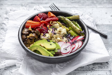 Veggie bowl with quinoa, vegetables, feta, strawberries, avocado, pine nuts and cress - SARF04253